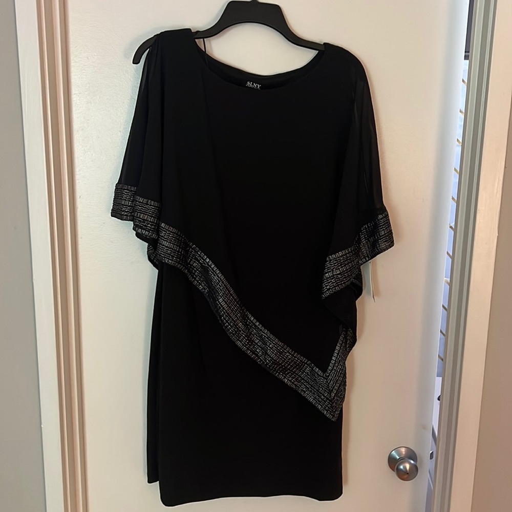 Black dress with sheer overlay